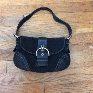 Black COACH purse with buckle